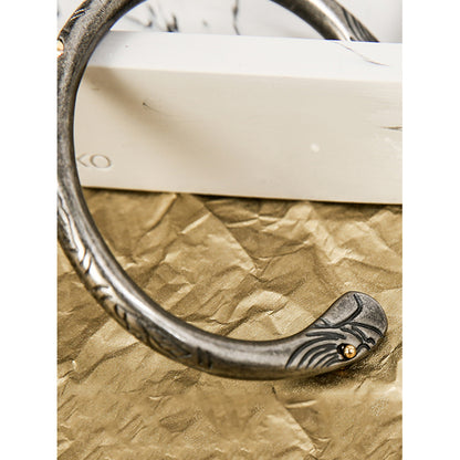 Intricate Inlay Wristlet